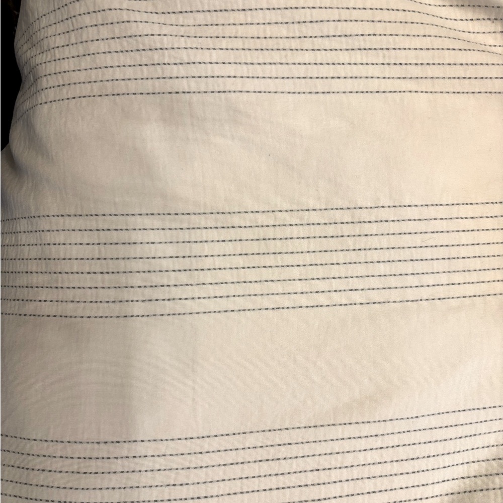 White duvet with gray-blue stripes.